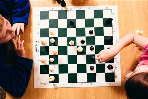 Students play chess
